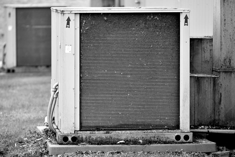 Close-up of an industrial HVAC unit outdoors, showcasing its metal texture. - Photo by Jay Brand on Pexels